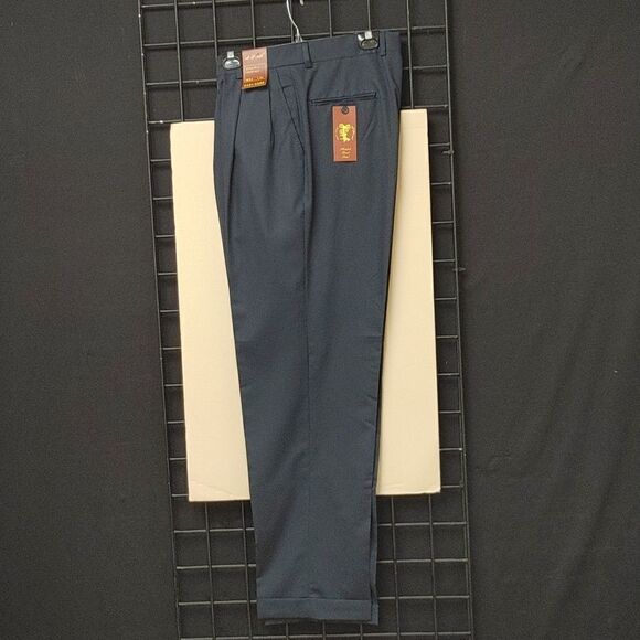 ST. PATRICK NAVY POLY/RAYON PLEATED DRESS SLACK.